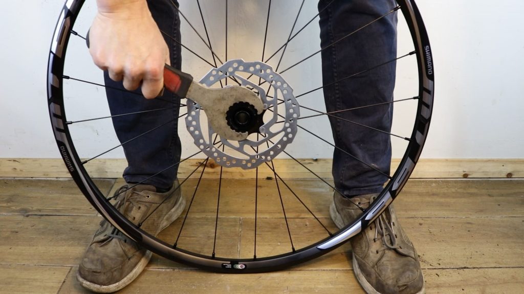 undoing the lock ring on bike rotor