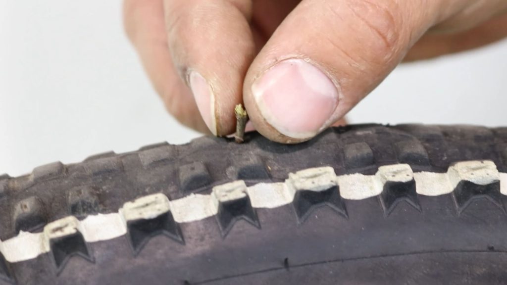 deflated tyre - removing debris