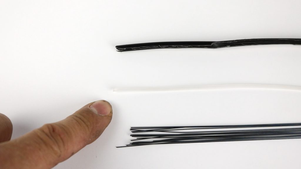 replacing gear cable on bike with new outer made of the plastic coating, thin P.T.F.E tube and many lengths of wire