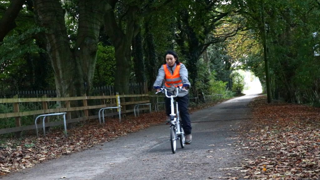 Cycling safety equipment like bright colour clothing are more visible in the day