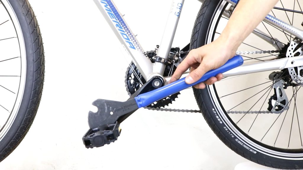 Removing bike pedals using pedal spanner