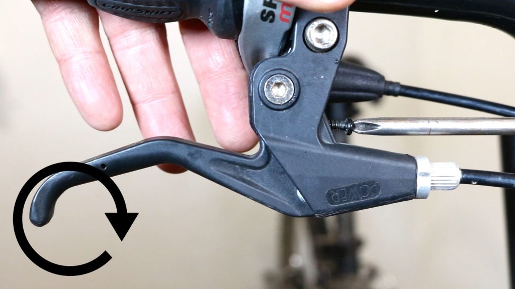 adjust brake lever reach by turning the screw clockwise