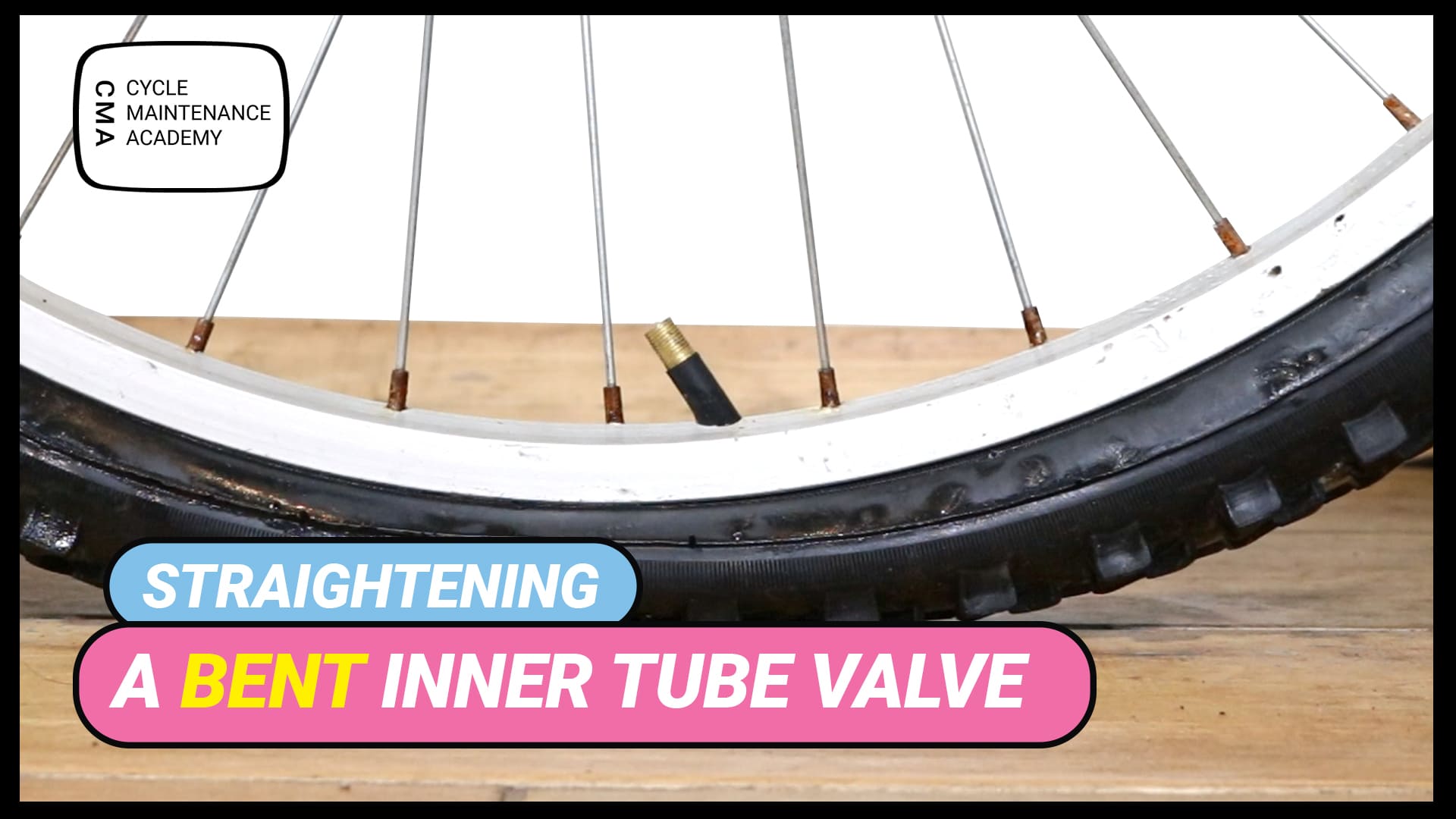 https://www.cyclemaintenanceacademy.com/wp-content/uploads/2023/01/Straightening-a-bent-tube-valve.jpg