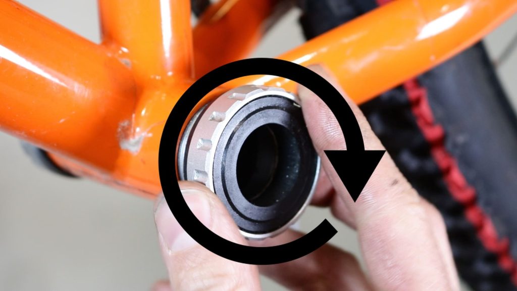 left external bottom bracket cup screws in clockwise