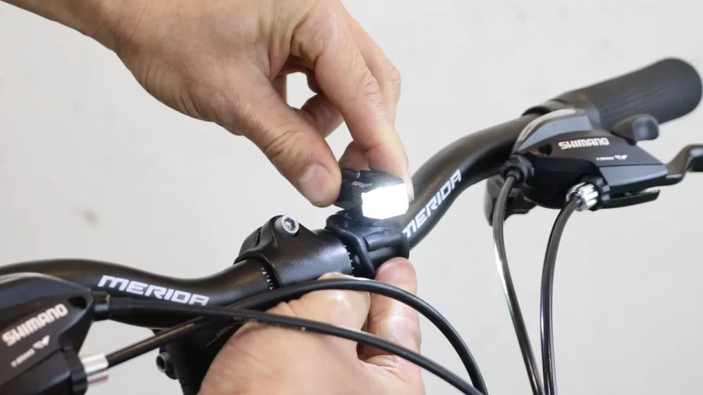 front bike lights are usually fitted on the handlebars