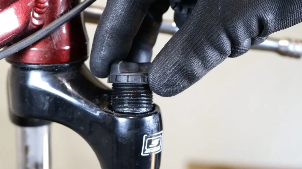 remove the preload adjuster from suntour forks