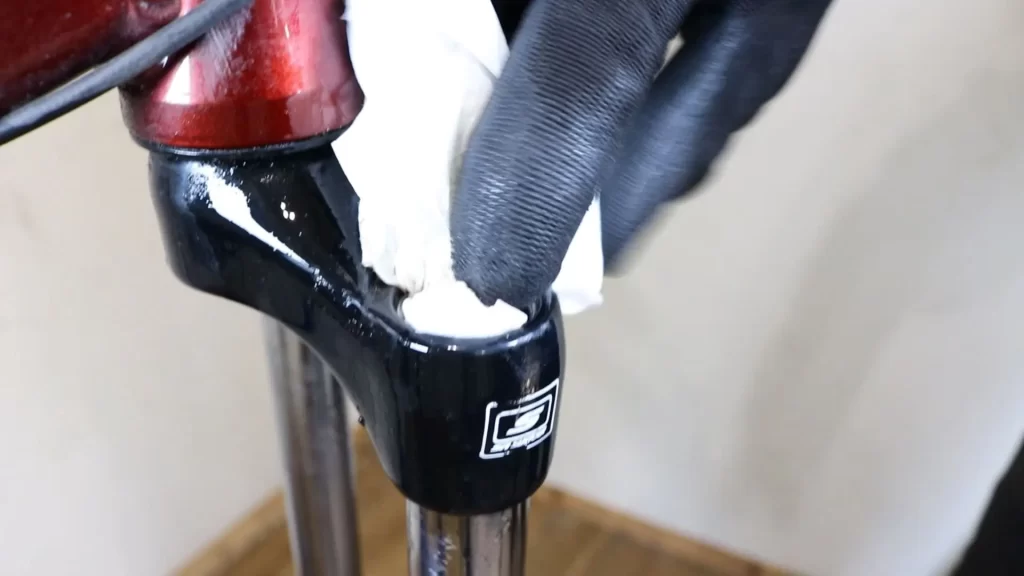 clean the threads in the drive side stanchion on suntour forks